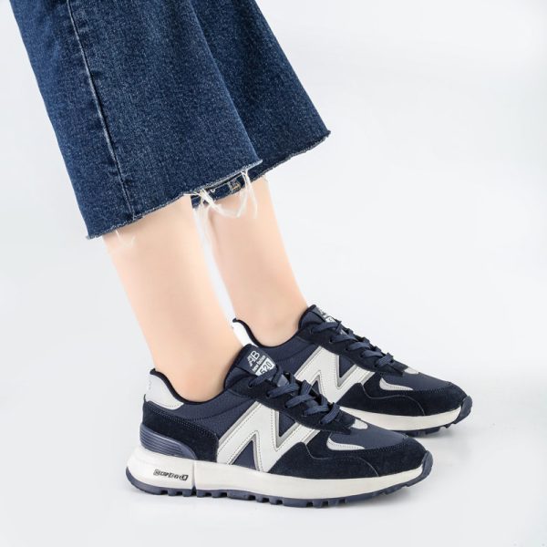 کفش و کتانی زنانه و دخترانه مدل نیوبالانس NEWBALANCE رنگ سرمه ای سفید کد M677